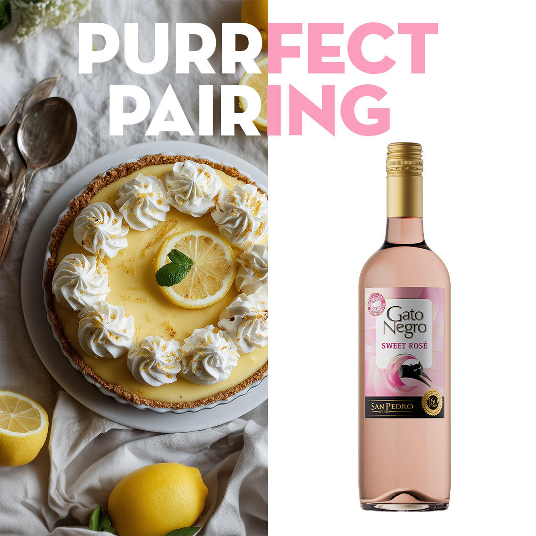 Lemon tart with whipped cream and a bottle of Gato Negro Sweet Rosé wine on a white background.