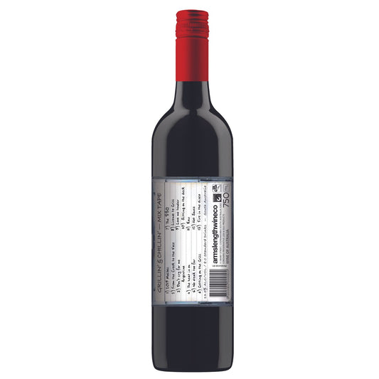 Wine bottle with a red cap on a white background