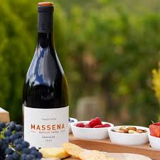 Massena Stonegarden Grenache 2019 with lifestyle background