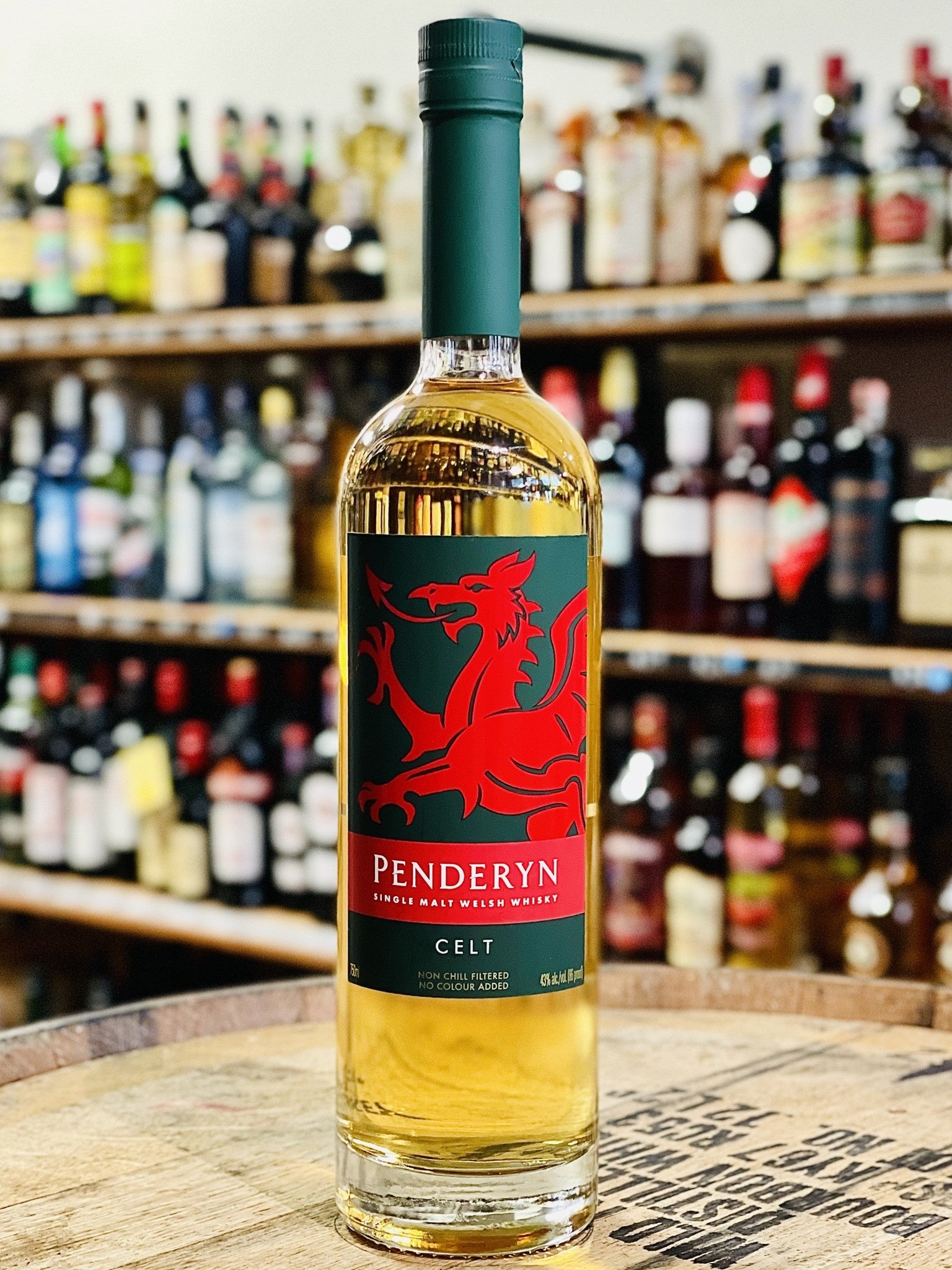 Penderyn Welsh Single Malt Whisky Dragon Range Celt bottle with store background 