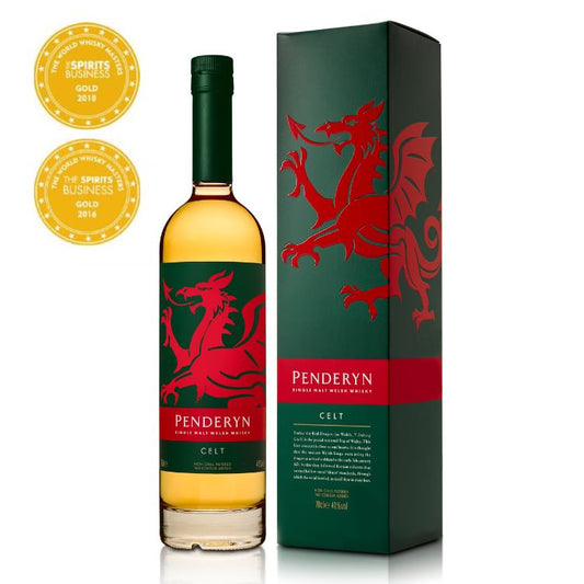 A bottle of Penderyn Welsh Single Malt Whisky with a red and green dragon design on the label, accompanied by a black box with a gold award badge for 'Sports & Athletics'.
