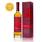 A bottle of Penderyn Welsh Single Malt Whisky with a red label featuring a red dragon, alongside a box with the same design and a gold award seal.