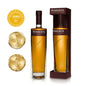 A bottle of Penderyn Welsh Single Malt Whisky with a Sherrywood finish, accompanied by a gold and a bronze award coin, all presented in a branded cardboard packaging.