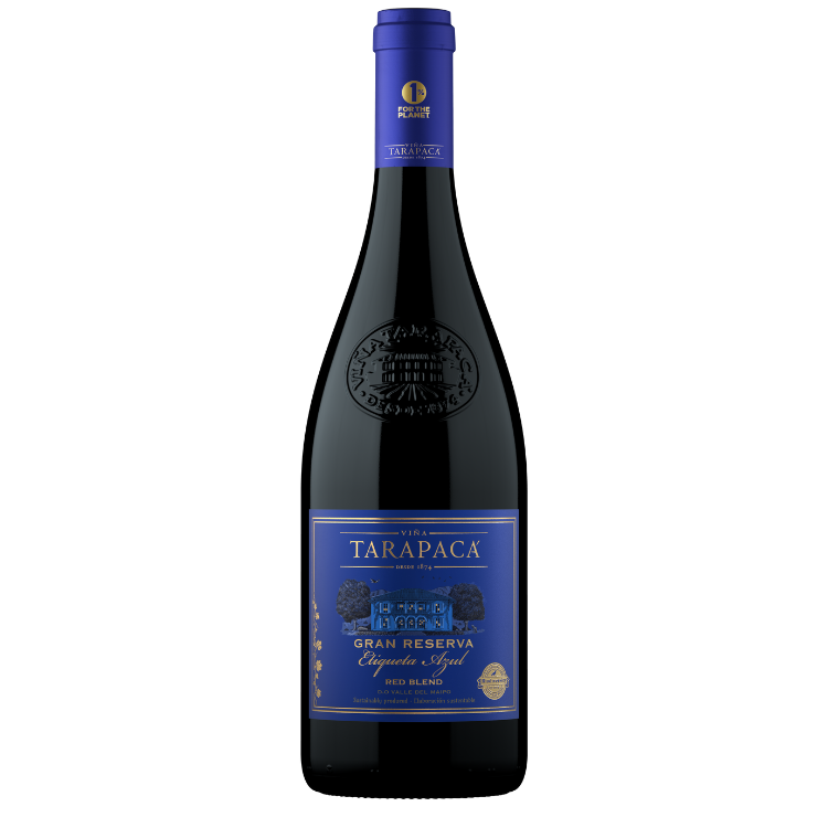 Bottle of Tarapaca Gran Reserva Red Blend wine with a deep ruby label and blue text indicating the variety of grapes.